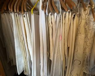 Large collection of linen tablecloths, napkins, etc. including lace, cutout, embroidered, linen, etc