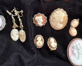 Antique/vintage cameo brooches, earrings and rings.