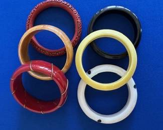 Vintage bangle bracelets including Bakelite and Cinnabar.