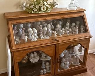 Precious Moments Figurine Collection in Oak Display Cabinet