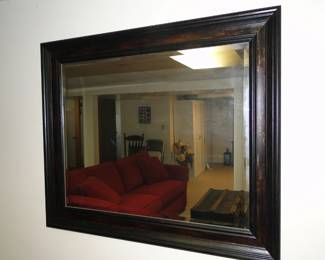 Wood framed mirror, looking into other items that we have for sale too, but the RED COUCH  is not for sale