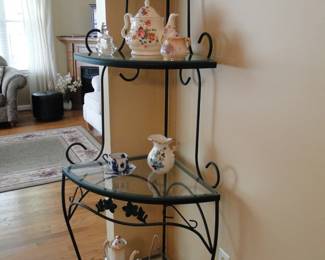 Corner bakers rack with corner bakers rack stuff on it