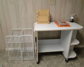Another sewing table and a few nice storage racks too