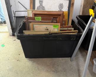 A large collection of framed vintage art.