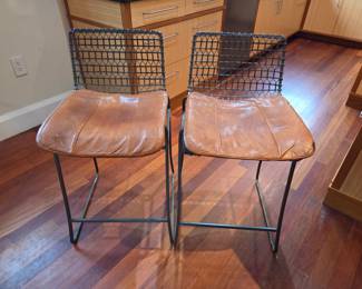 Pair of wired metal bar stools with leather pads