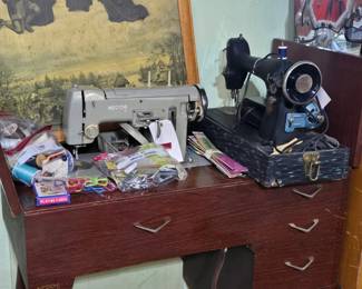 Necchi sewing machine in branded Necchi cabinet.