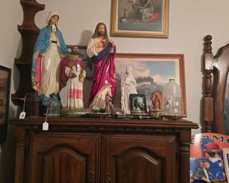 First bedroom on the right, vintage religious items