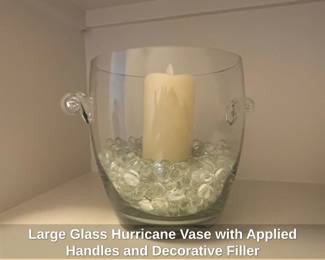 Large Glass Hurricane Vase with Applied Handles and Decorative Filler