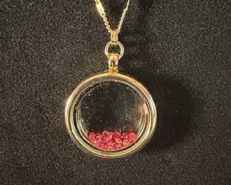 Gold Tone Floating Charm Locket Necklace with Pink Crystals