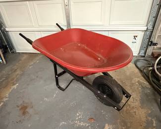 Red Plastic Wheelbarrow with Black Metal Frame