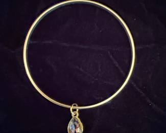 Gold Tone Bangle Bracelet with Pear-Shaped Crystal Charm