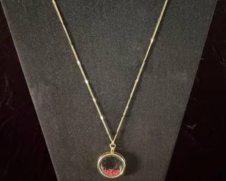 Gold Tone Floating Charm Locket Necklace with Pink Crystals