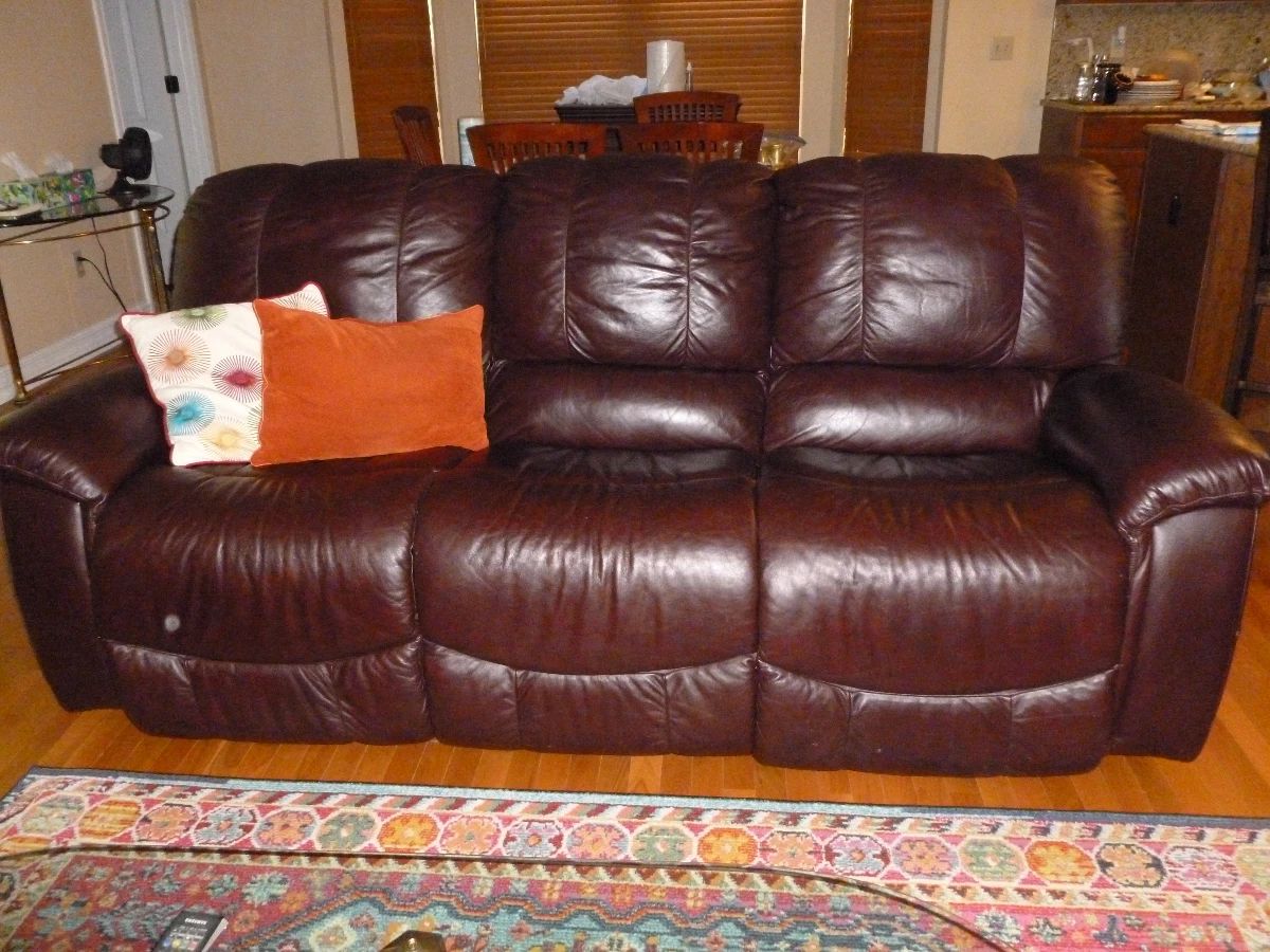 Beautiful Leather Reclining Sofa (hard to tell if it's dark burgundy or brown)