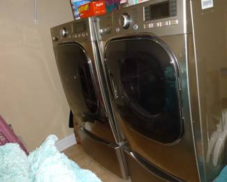 LG Washer & Electric Dryer on Pedestals 