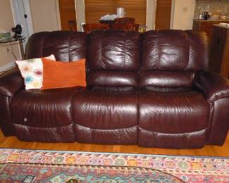 Beautiful Leather Reclining Sofa (hard to tell if it's dark burgundy or brown)