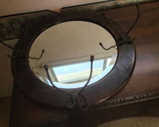 mirror with hat hooks