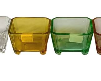 188 - 4 Heisey Salt Cellars (Description): Crystal, Moongleam, Flamingo & Marigold