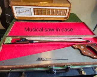 Musical saw in original case with bow.