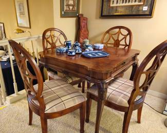 Game table with spider back chairs. Wedgwood collection
