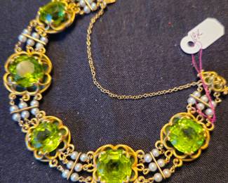 18k, pearls, lab peridot bracelet. 14k guard chain.