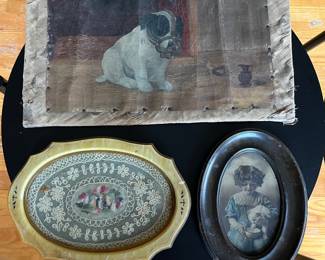  Intake oval vanity tray featuring lace embroidery insert; antique oval-frame photograph of a girl feeding a kitten; antique painting of a bulldog wearing a muzzle.