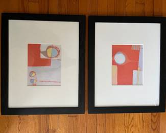 Pair of framed modern abstract prints.