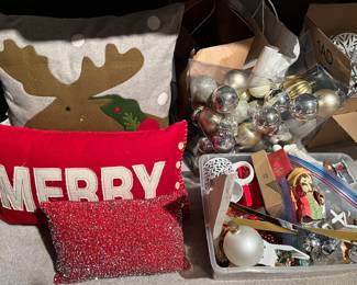 Large selection of Christmas ornaments and decorations.