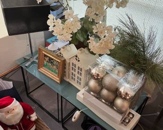 Large selection of Christmas ornaments and decorations.