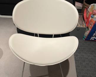 Vintage leather clam shell chair.