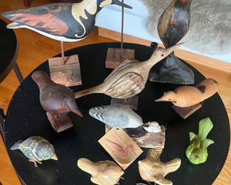 Many hand/carved and pottery bird sculptures, most signed.