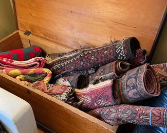 Antique chest; nice selection of vintage rugs.