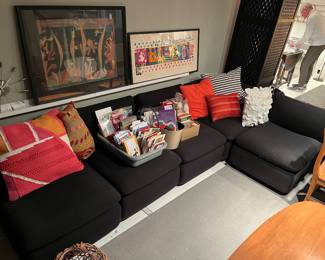 Sectional sofa; extensive selection of artwork and home decor throughout the house.