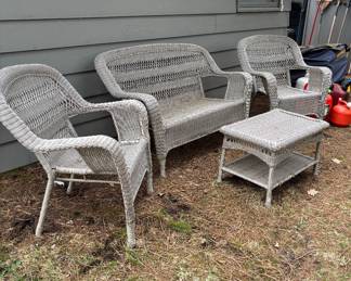 Four-piece wicker patio set.