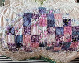 Hand made purple, pink, and green quilt