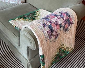 Hand made purple, pink, and green quilt