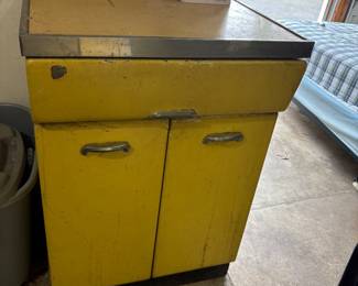 vintage yellow cabinet