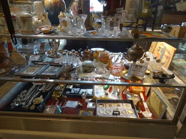 The Collectible Cases are loaded w/ am. coins,silver, jewelry, clocks, and just about everything else !