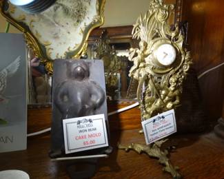A small Iron "Bear" Cake Mold & An Unusual key wind watch holder "Father Time"