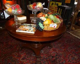 An Antique Mahogany Center (or perhaps a Breakfast table) on single Carved Support and Lg. Claw Feet