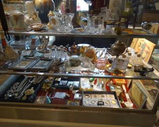 The Collectible Cases are loaded w/ am. coins,silver, jewelry, clocks, and just about everything else !