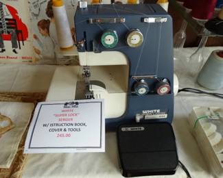 "like new" white Serger w/ Instructions book and cover
