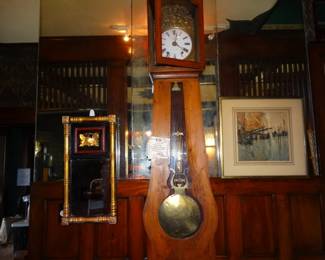 The Imposing Wag-On-Wall Clock that has retained the Original Hand Decorated Pine Case ( Runs & Keeps time Perfectly and is a Repeater) it is flanked by A Newly restored AmericanEmpire (1820-40)Wall Mirror and a signed Watercolor