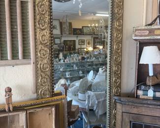 beautiful, ornate gold mirror