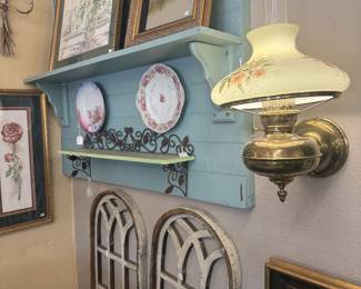 framed oils, decorative plates, arched window frames, vintage brass Rayo-style wall bracket oil lamp