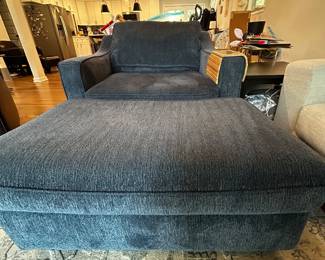 Blue upholstered chair and ottoman