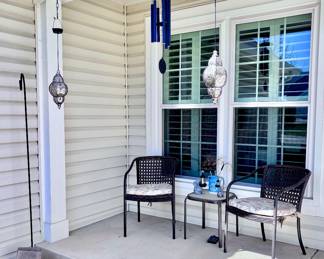 Outdoor Armchairs, Outdoor Table, Wind Chime and Solar Lanterns