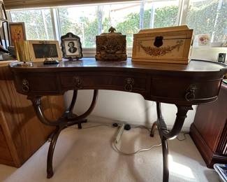Needs minor repair. Wood writing desk