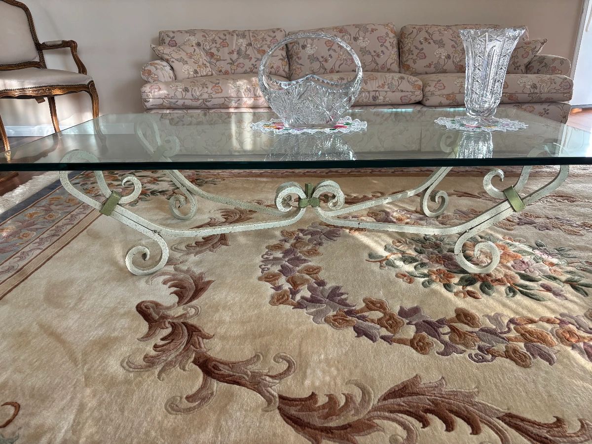 Floral sofa, large Chinese area rug, mid century cocktail table, Czech crystal accessories