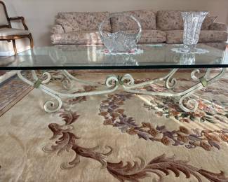 Floral sofa, large Chinese area rug, mid century cocktail table, Czech crystal accessories