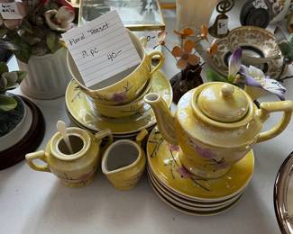 #144	floral teaset yellow with cherry blossom 19 pc	 $40.00 			